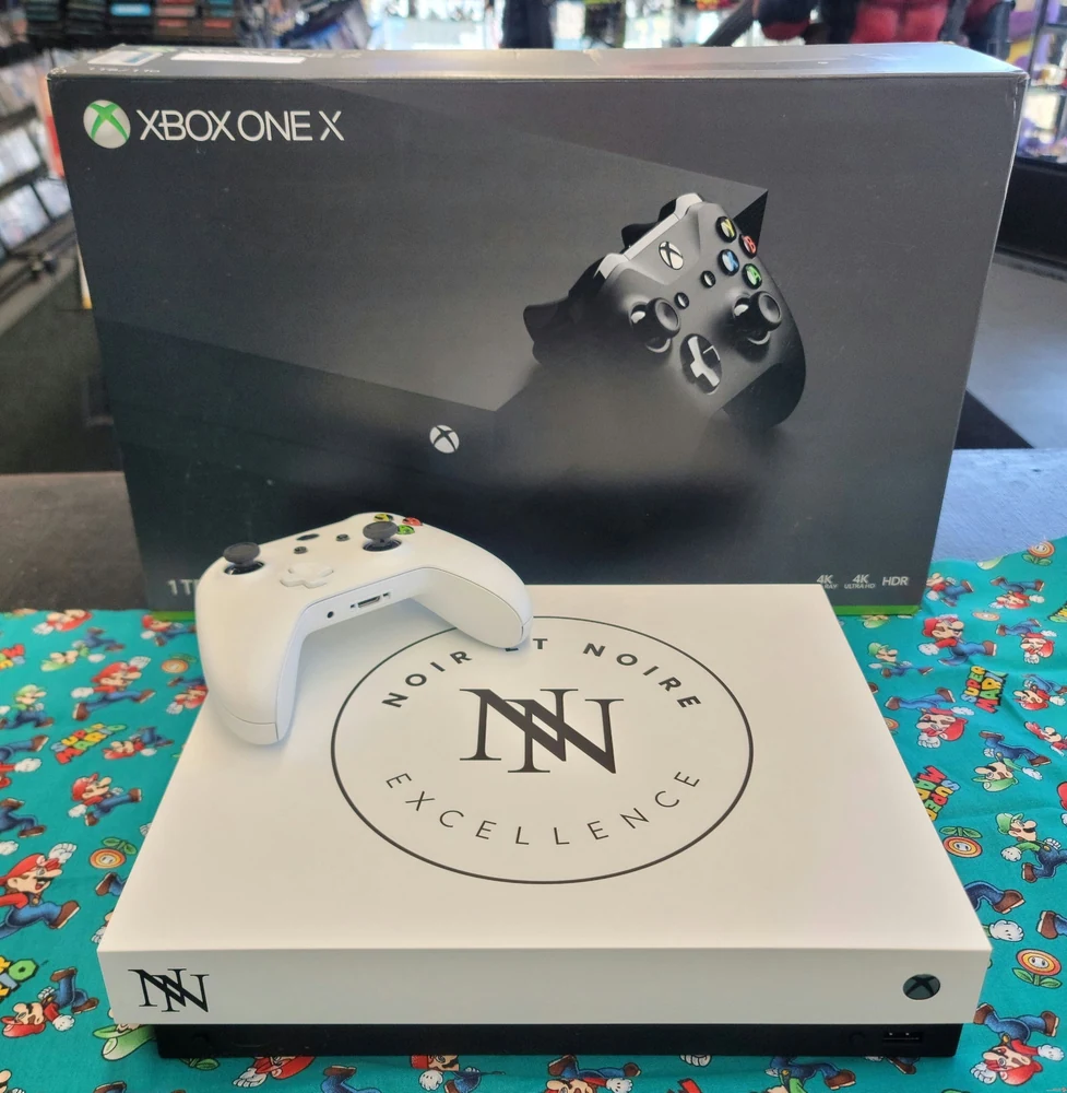 Microsoft Xbox One X Noir et Noire Excellence